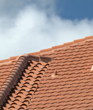 Can a New Roof Installation Help in Reducing Home Insurance Premiums?