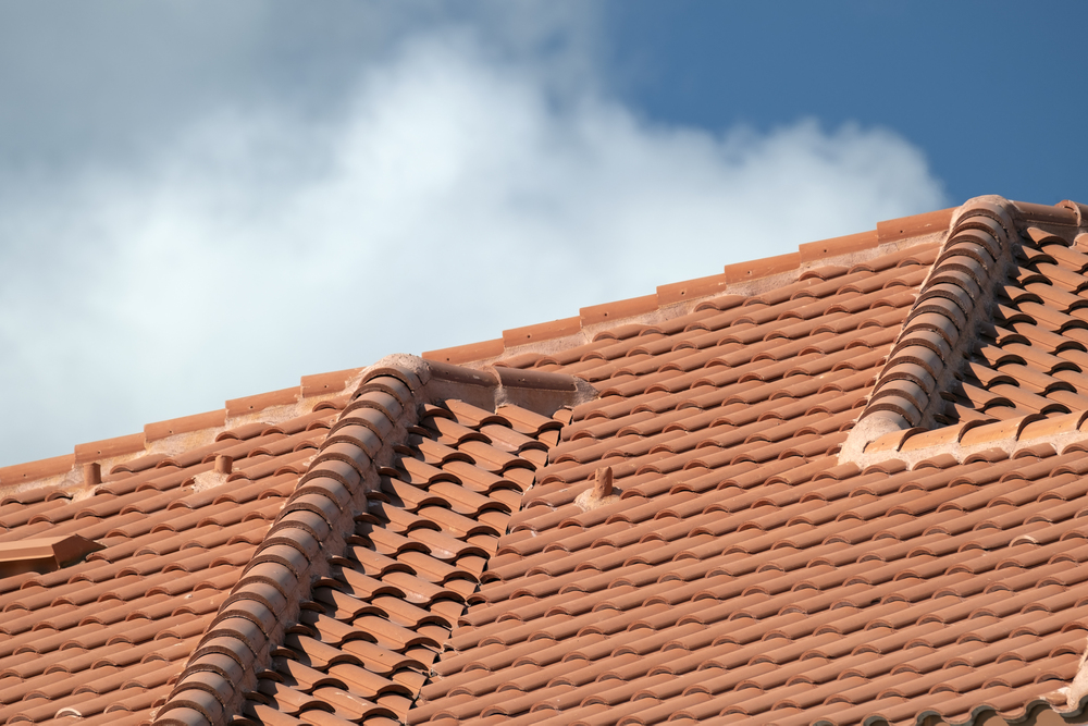 Can a New Roof Installation Help in Reducing Home Insurance Premiums?